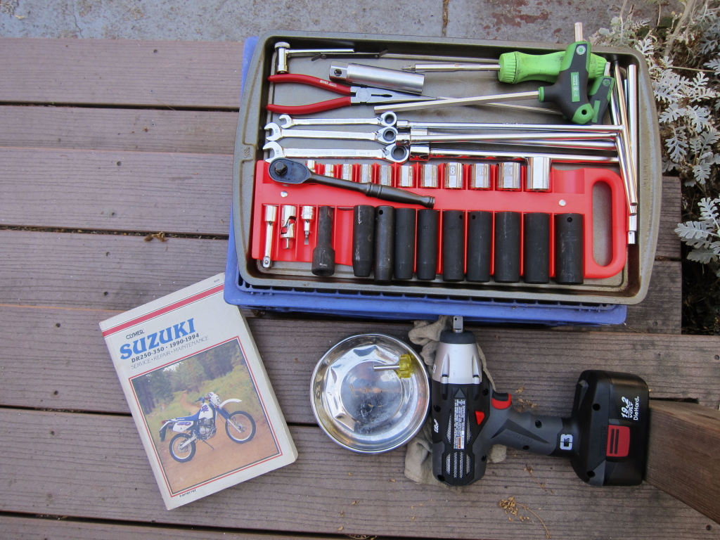 Tools, manual and supplies, laid out for action