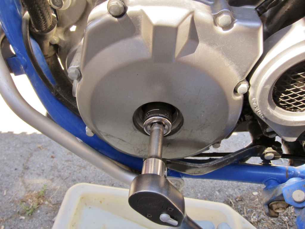 17 mm socket on the rotor bolt, turning counter-clockwise